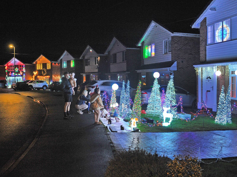 Houses lit up for Christmas in Stone Brig Lane in Rothwell.