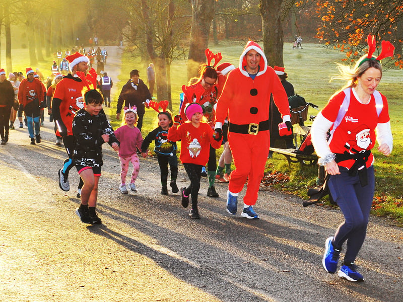 Roundhay Park runners dressed up in festive gear for the early morning sun