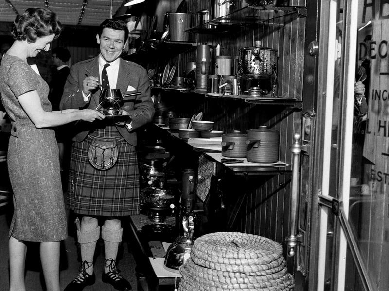 Andy Stewart being photographed for an ad feature for Hendry Decor, on Lothian Road, in July 1965.
