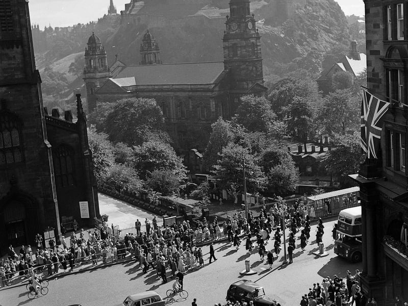 Edinburgh City Police pipe band performing on Lothian Road in August 1959.