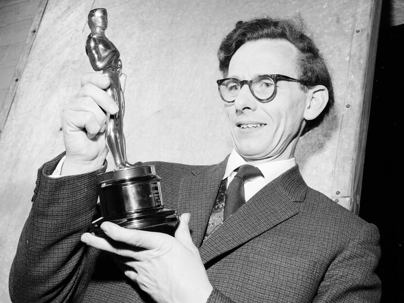 Robert Riddell Black is presented with his Oscar for producing the film 'Seawards The Great Ships' by Sir Alex King at the ABC Cinema in Lothian Road in August 1962.