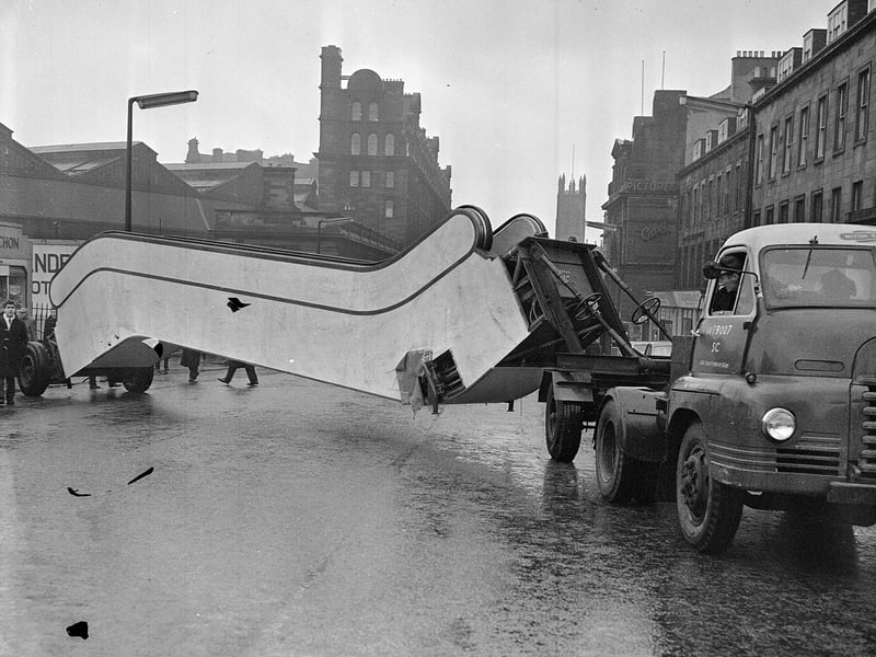 An escalator for a new supermarket leaving the railway goods yard in Lothian Road in January 1963.