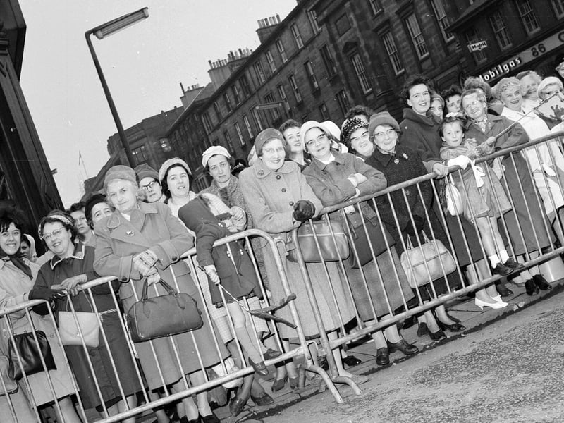 Crowds waiting in Lothian Road to see King Olav of Norway during his state visit to Scotland in October 1962.