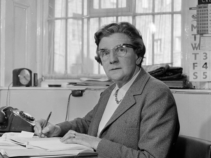 Mrs M Smith of the tailors and University outfitters JC Smith Ltd of Lothian Road in September 1964.
