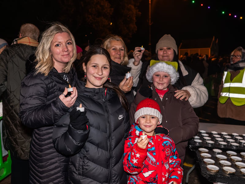 Lake of Lights by Rowans Hospice at Canoe Lake in Southsea. Pictured is people 'lighting' their candles. Pictured by Alec Chapman