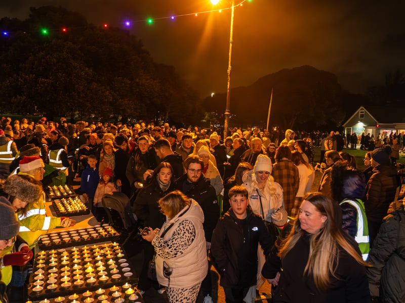 Lake of Lights by Rowans Hospice at Canoe Lake in Southsea. Pictured is people with the candles. Pictured by Alec Chapman