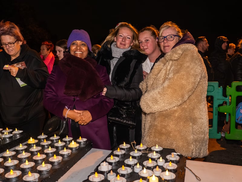 Lake of Lights by Rowans Hospice at Canoe Lake in Southsea. Pictured is people with the candles. Pictured by Alec Chapman