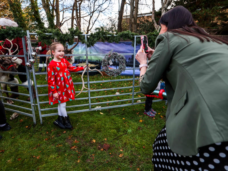 Meeting the reindeer: Young guests had the opportunity to get up close with real reindeer at the festive celebration.