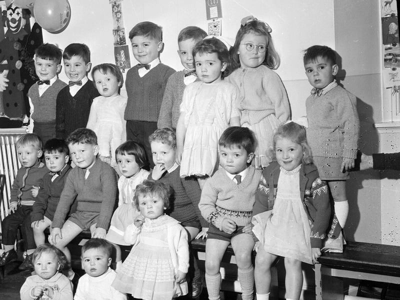 A toddler's playground Christmas party at 65 Pleasance in 1963.