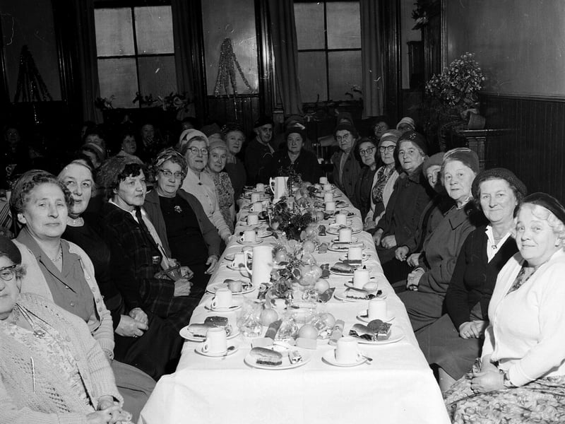 The Edinburgh and Leith Old Peoples' Welfare Council annual Christmas Party in the Drummond Hall in 1962.
