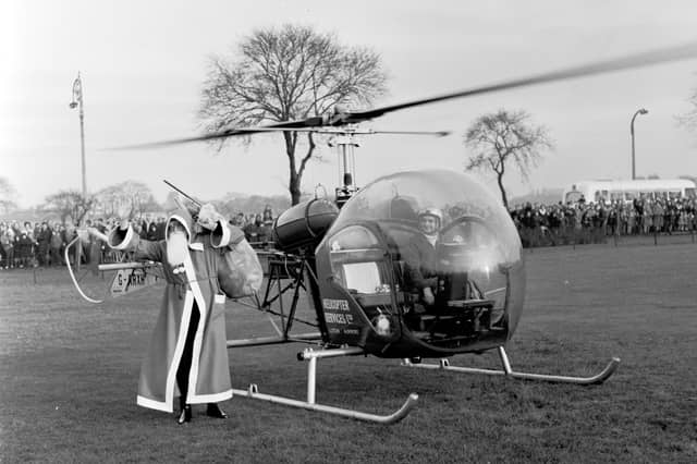 Santa Claus arrives at Leith Links Edinburgh by helicopter in 1965.