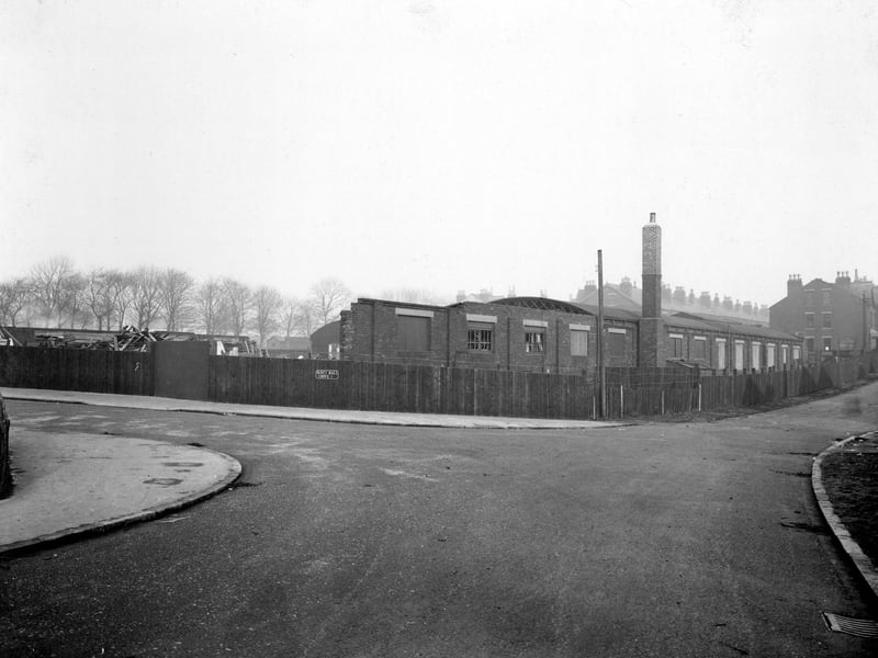 Sholebroke Mount showing the junction with Scott Hall Grove to the left. A single storey building is in a state of dereliction. The photo is marked 'Proposed sight for PH' and the Scott Hall Hotel was to be built on the corner here, while the building in the background remained as Rink Works Joinery.