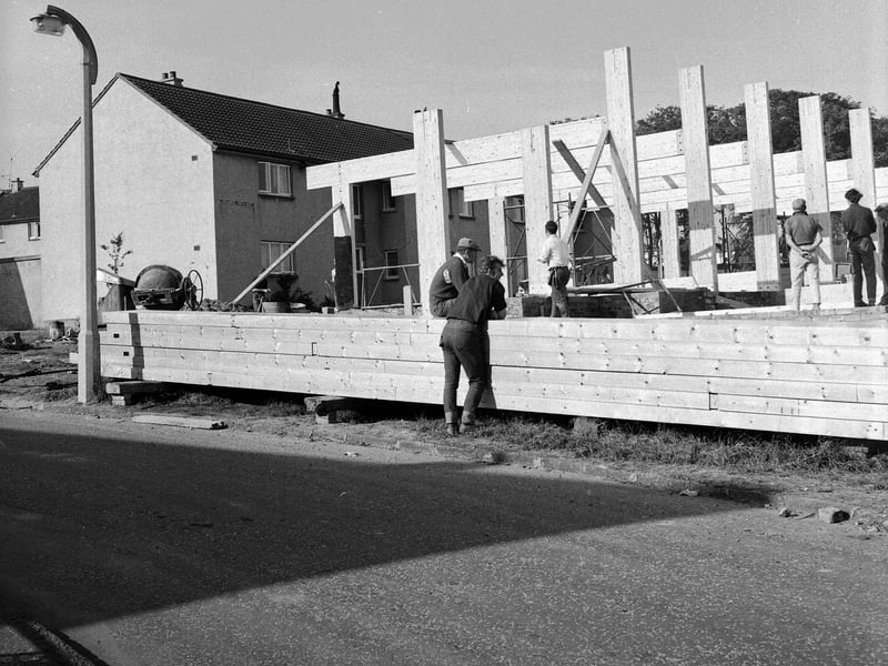 A new Community Centre being built in front of houses at Oxgangs in August 1965.