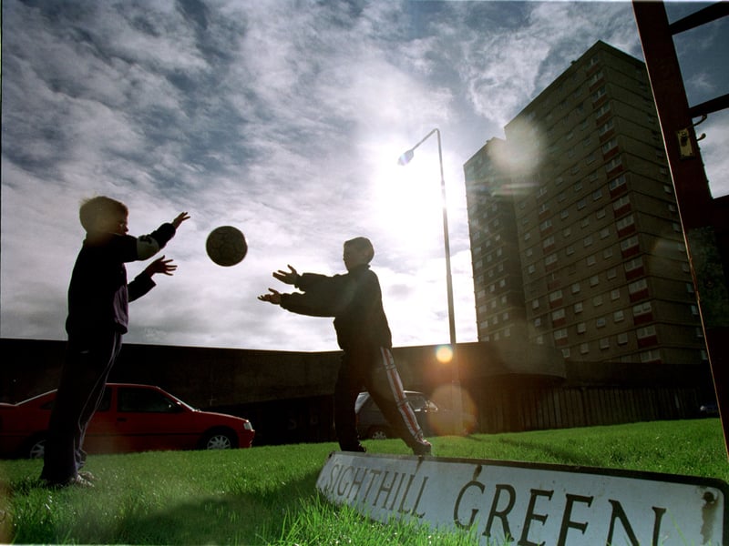 Children playing at Sighthill Green, a high-rise development in Glasgow
