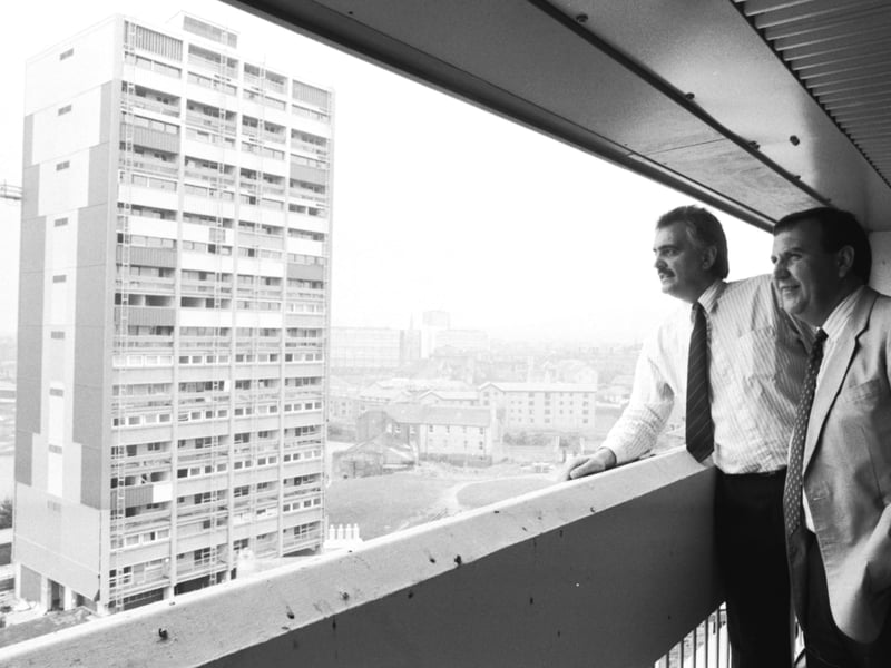 Colin Bellett (right) and Gleeson's John McEwan enjoy the view from the newly-refurbished Persevere Court tower block in Leith, in September 1989. The other tower block is Citadel Court.