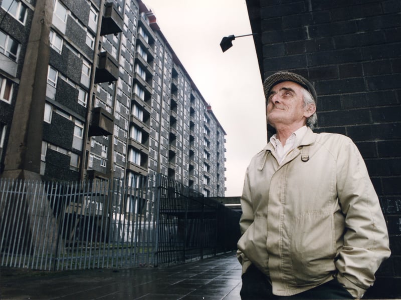 Gerry Gallagher outside the flats designed by Sir Basil Spence, part of the Hutchesontown complex at Queen Elizabeth Square in Glasgow, in 1993, amid debate over whether the flats should be demolished or preserved as an example of modern architecture