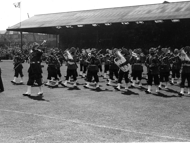 The Pies and Drums of The Indian 61st Cavalry Regiment,  who were appearing at the Military Tattoo, perform at half-time at a football match at Tynecastle Park in August 1962.