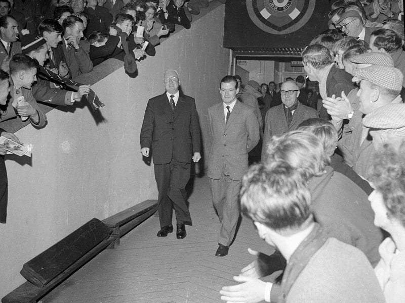 Willie Bauld is cheered by fans at his Hearts v Sheffield testimonial game at Tynecastle during Bauld's last season for Hearts before his retirement in November 1962.