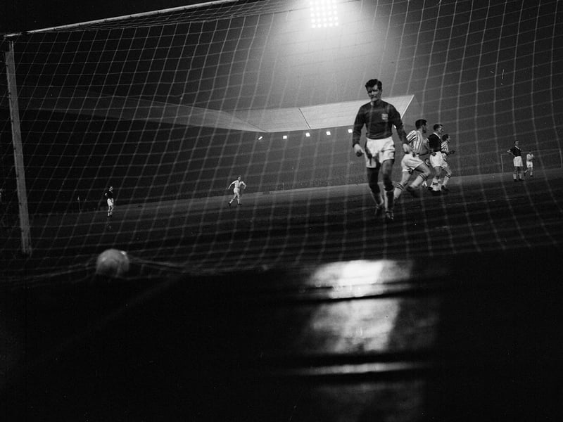 Bobby Williamson walks towards back of net after a Billy Higgins' goal in a Hearts v Arbroath match at Tynecastle in March 1960.