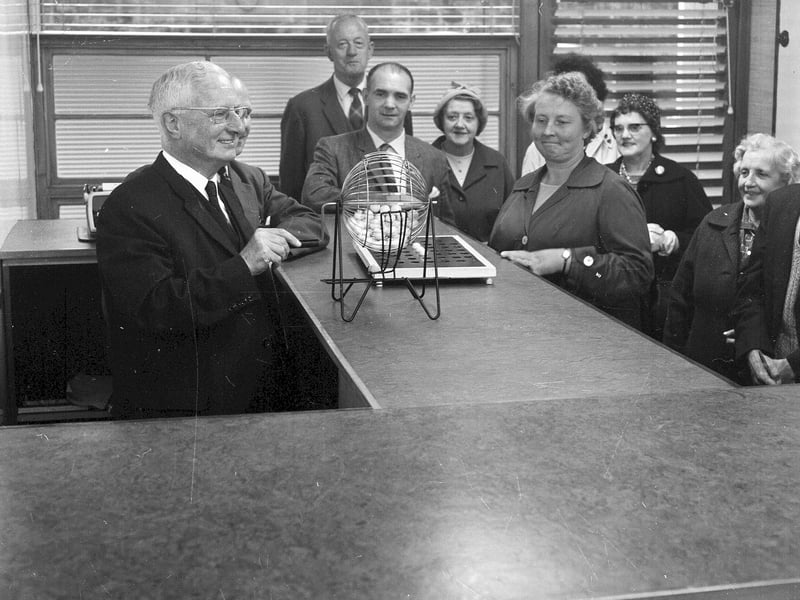 Hearts chairman Wilson Strachan makes the first draw at the new football pool run by the club in September 1964.