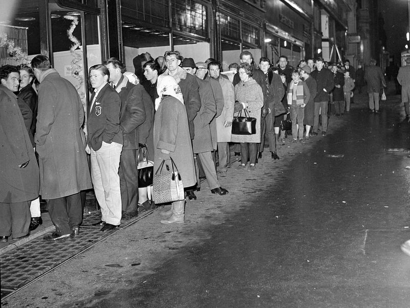 People queue for tickets to the Hearts v Hibs Edinburgh New Year's Day derby match in 1965.