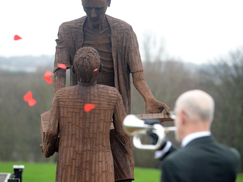 Len’s bravery and kindness in the face of extreme cruelty has inspired so many over the years and the sculpture depicts the music teacher at the time of his liberation handing his homemade banjo to a young local boy as a symbol of peace and forgiveness.