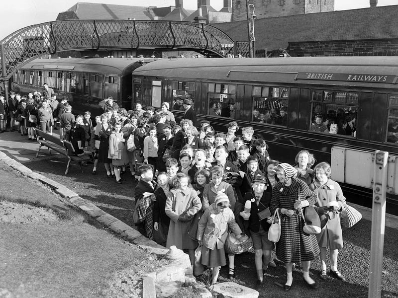 Murrayburn School pupils board British Rail train bound for St Andrews at Gorgie East Station in March 1961.