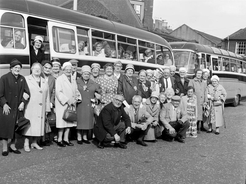 OAPs leave in buses outside Gorgie War Memorial Hall for a day's outing to Largs in June 1961.