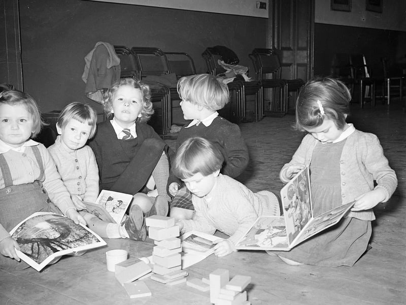 A children's creche at Springwell House, in Gorgie Road, organised to allow mothers to attend Civil Defence classes in February 1956.