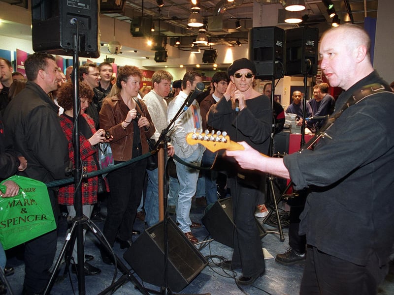 Paul Roberts (vocals) and John Ellis (guitar) of The Stranglers during an acoustic set by the band at the HMV store in Leeds to promote their new album 'Written in Red'.