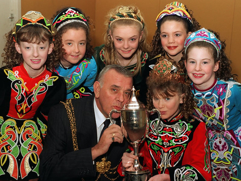 World Irish Dancing champion, Sinead Fallon invited the Lord Mayor of Leeds, Coun Malcolm Bedford, to give the trophy she won last year a good luck 'kiss' before she headed off to Ireland with other dancers to compete. Pictured, back from left, are Donna O'Connor, Rachel Watson, Ellen McCormack, Helen Roland and Kirsty Mooney.