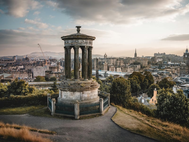 With 196,000 Instagram hashtags, Calton Hill is another excellent option if you're planning to propose in the Edinburgh area, offering iconic views over the city without needing to climb like some other destinations in our ranking. The hill is home to several monuments, including the National Monument (often referred to as "Edinburgh's Disgrace") and the Nelson Monument, which create a distinctive backdrop for your post-proposal photos. The easily accessible location makes it ideal for those planning a surprise proposal, as you can easily incorporate it into an evening walk without raising any suspicion. Calton Hill is especially romantic at sunset, when the sky turns pink and purple behind the Edinburgh skyline, making it perfect for capturing the romantic mood.