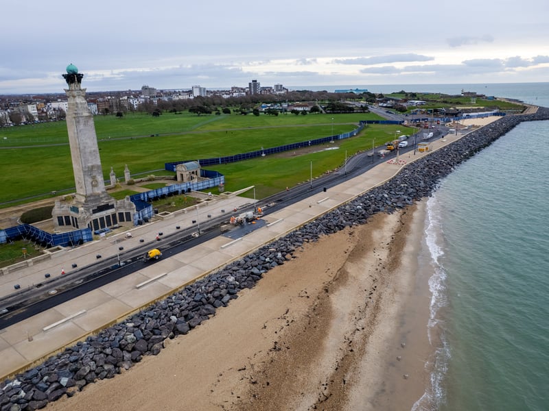 Ongoing works to the sea defences in front of Southsea Common. The new promenade has new seating, with the memorials moved into place
Photos by Alex Shute