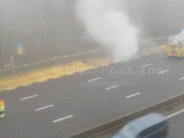 Firefighters respond to vehicle fire which has closed all lanes of the M1.