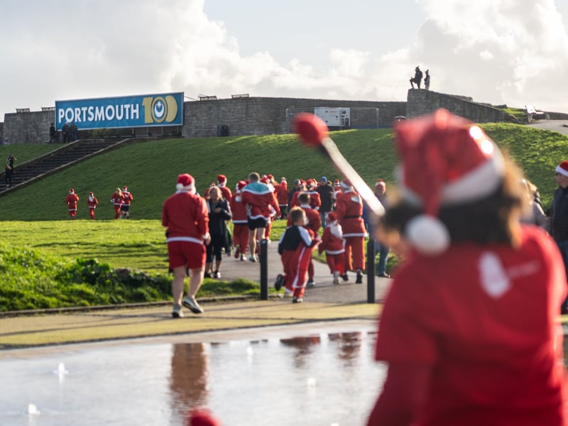 Southsea turned into a sea of red as hundreds of people took part in the Santa run 5k and 10k. Pictured is people running the Santa run. 

Picture: Alec Chapman