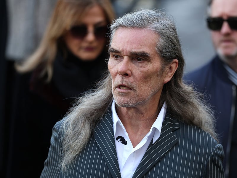 Stone Roses singer Ian Brown arriving.