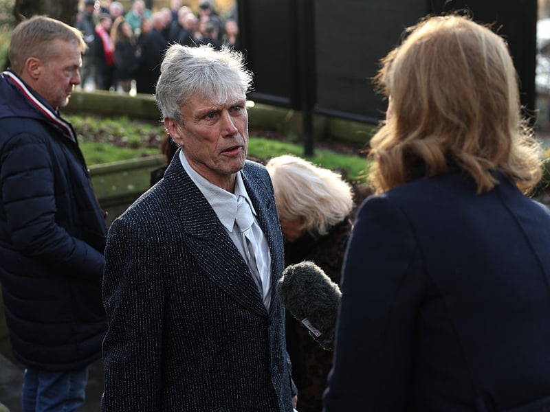 Bez, from The Happy Mondays, talking to a journalist.