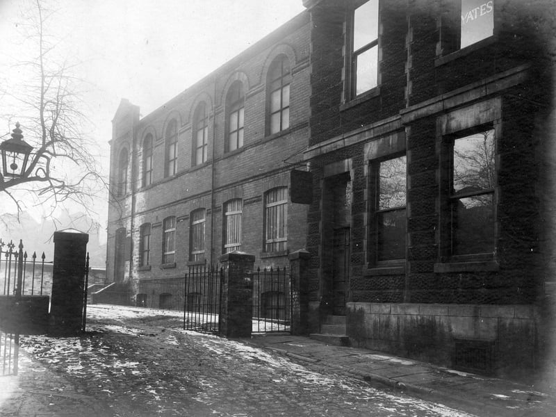 Buildings on New Briggate in February 1929. To the far left the building with decorative gable is St. John's House. The building with arched windows in the centre is the former New Briggate Synagogue, which, at the time, was due for demolition. Nash's Tudor Fish Restaurant is seen to the right and has been located here, fronting number 17 Merrion Street, since 1963.