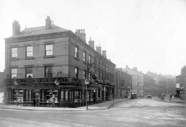 St. Peter's Street in the foreground, looking across to Lady Lane. On the right is the ornate facade of the Marquis of Granby public house. Pictured in November 1929.