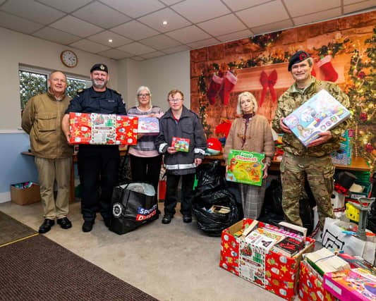 The Jacobs Well and Sultan staff with all the donations.