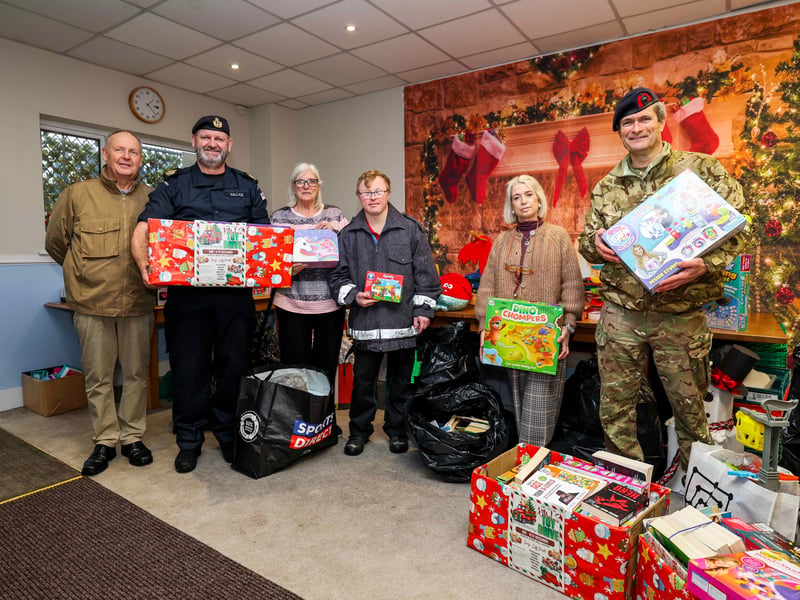 The Jacobs Well and Sultan staff with all the donations.