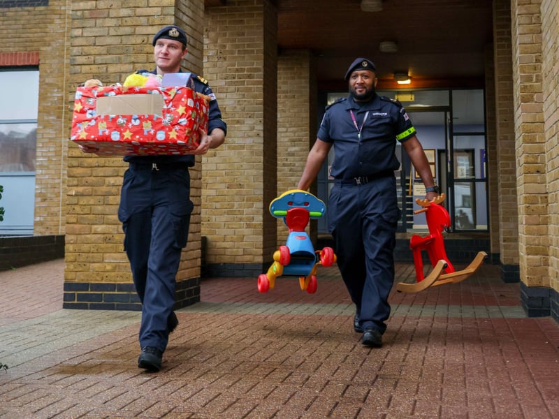 Personnel carrying donations.