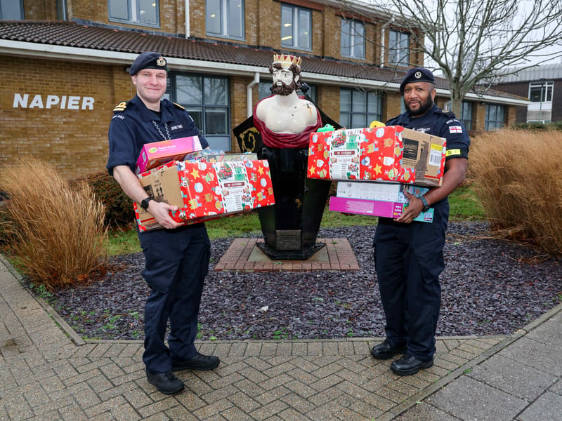 HMS Sultan staff with some of the donations.