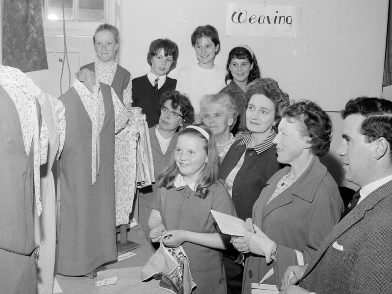 Parents examine handiwork at the Pioneer Club organised jointly by Gilmerton Parish Church and the YMCA of Scotland in July 1965.