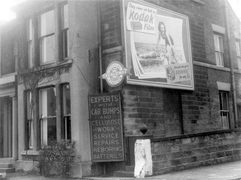 Trapps garage located at the junction of Harrogate Road and Stainbeck Lane. A sign gives details of the services which were offered. Pictured in November 1939.