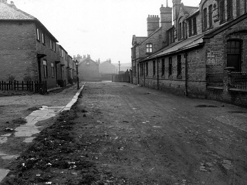 Looking south-west along Hall Place in November 1953. The building on the right is Leeds Friend's Adult School (on Pontefract Lane).