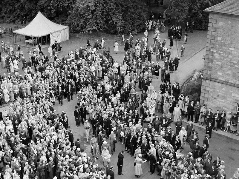 Queen Elizabeth II meets guests at the Drum Garden Party in Gilmerton in June 1955.