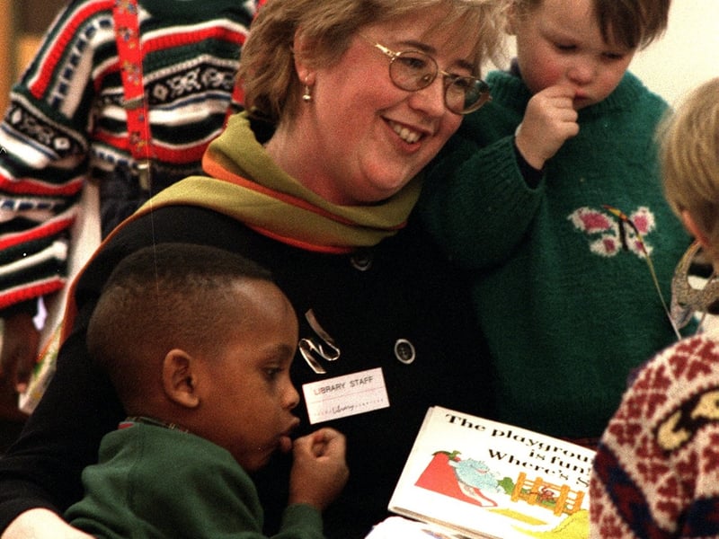 Catherine Blanshard, the new head of Leeds Library and Information Services, pictured reading stories for children at Chapeltown Library.