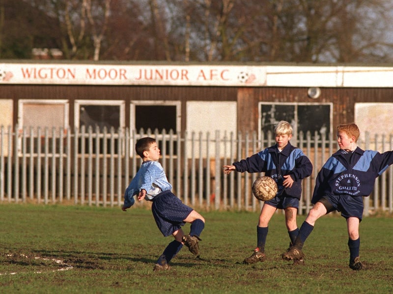 Wigton Moor Junior AFC players, from left, Robert Oxley, James Mills and Dennis Campbell in front of the clubhouse which was in need of improvement.