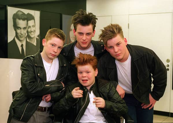 New look. Members of rock rock band Rockabeats following their new hair cuts at Vidal Sassoon salon on Albion Street. Pictured are Little Red, nine, (centre) with, from left Johnny B, 15, Slim, 16, and Sugar Ray, 14.